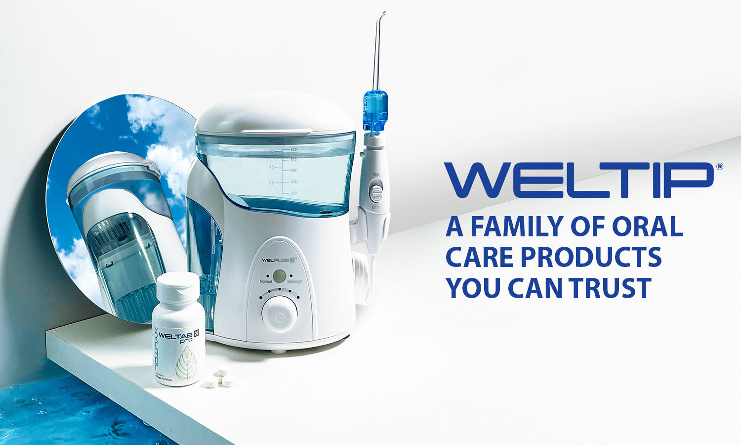 water flosser with tip and tablets reflecting in mirror