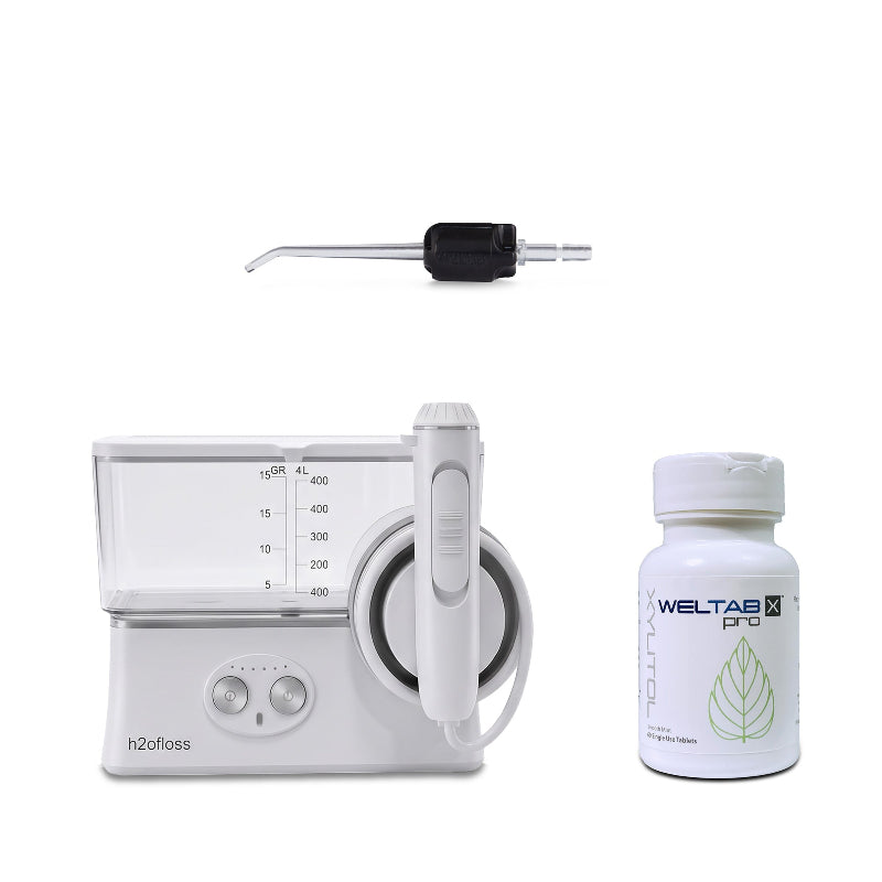 h2ofloss cordless water flosser with a black weltip and a bottle of weltabs