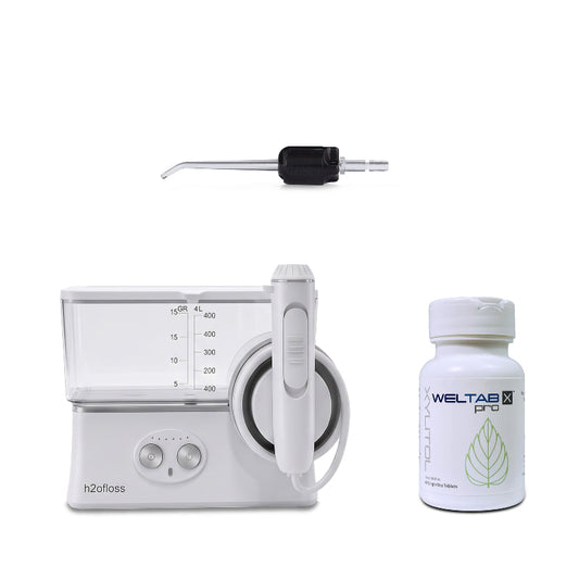 h2ofloss cordless water flosser with a black weltip and a bottle of weltabs