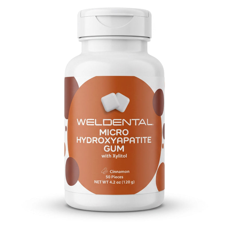 A white plastic bottle of Weldental Micro Hydroxyapatite Gum with a white cap, featuring a brown and white label with the brand name and product details.